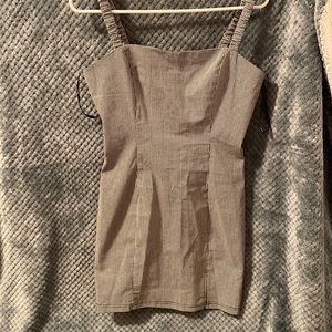 Brand new never used ! Tight black/white dress with small slit on the side :)